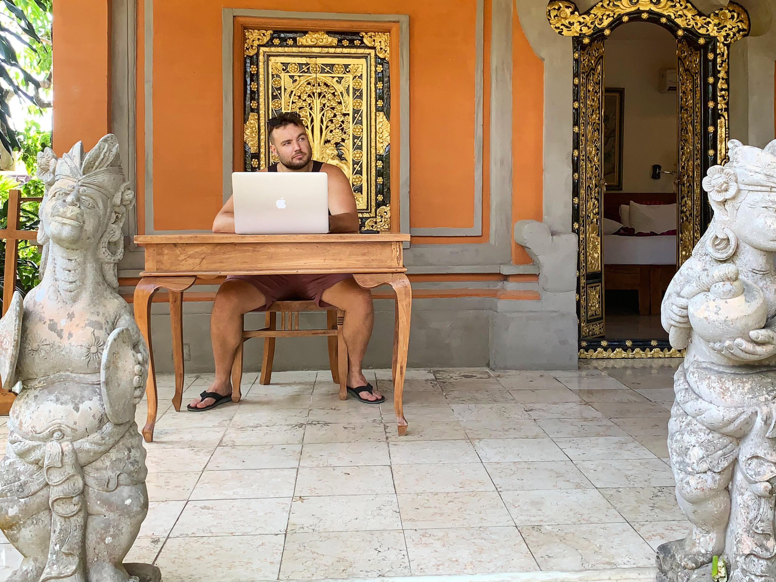 harry guinness working on laptop